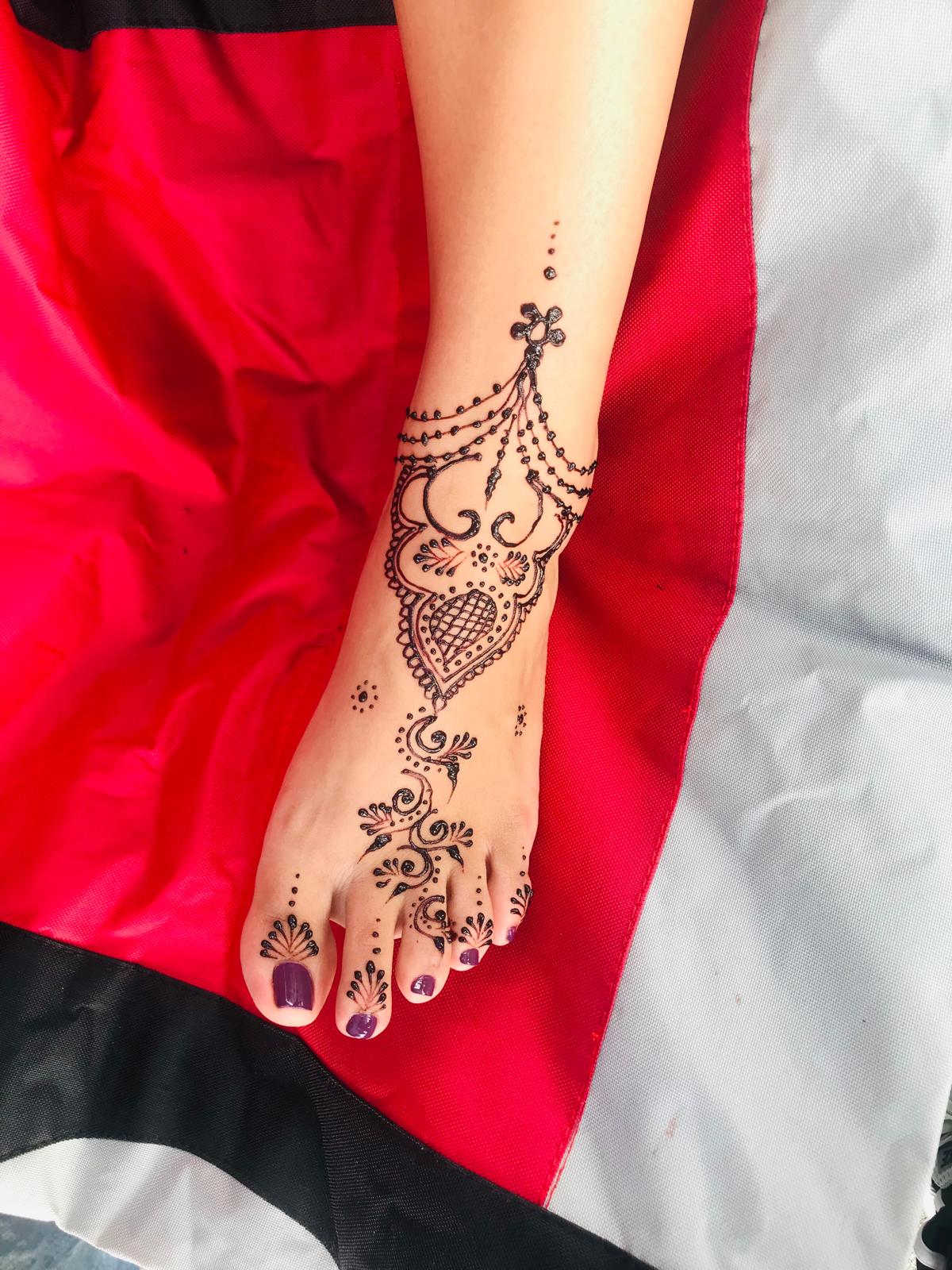 Ornate foot henna